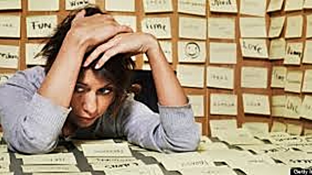 Stressed teenager with head in hands